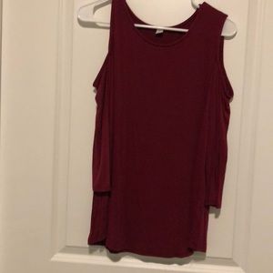 Maroon shirt three-quarter inch sleeve shirt.